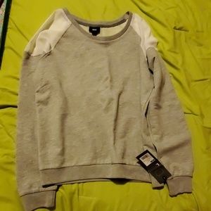 Sweater with sheer details.